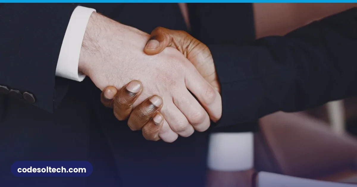 Business handshake closing a partnership deal