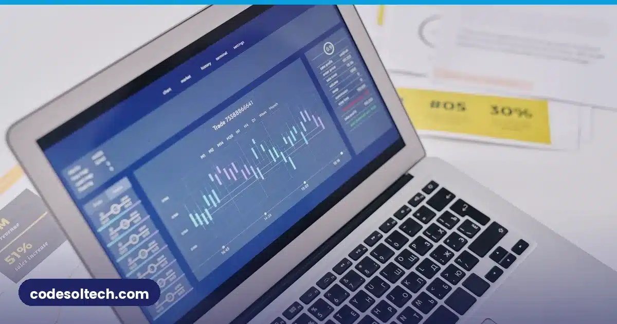Laptop showing business analytics dashboard with charts
