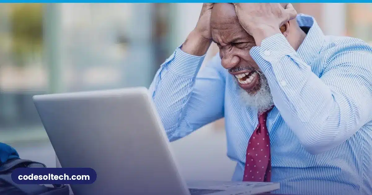 Frustrated entrepreneur facing a laptop problem