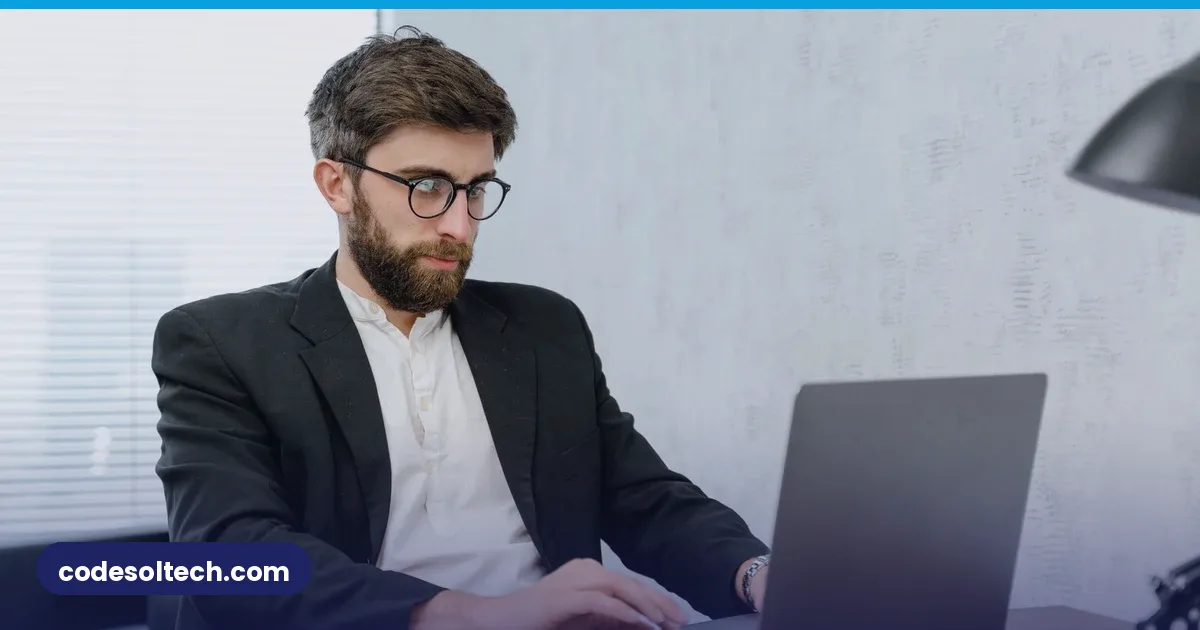 Businessman working on a laptop in an office