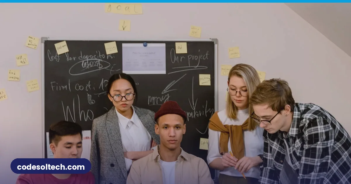 Tech startup team collaborating around a table in a modern office